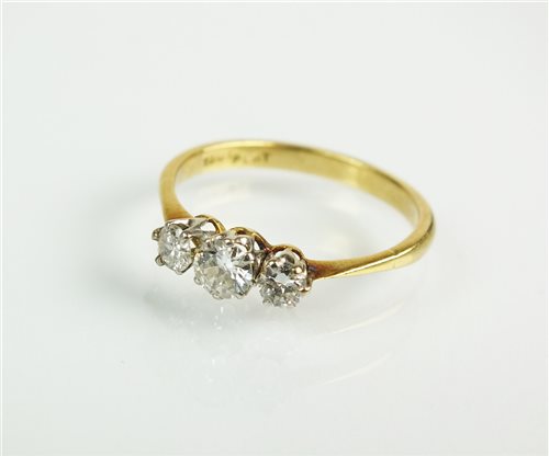 Lot 107 - A three stone diamond ring