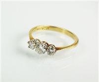 Lot 107 - A three stone diamond ring