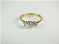 Lot 107 - A three stone diamond ring