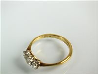 Lot 107 - A three stone diamond ring