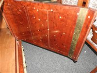 Lot 505 - A French Louis XVI style marble top plum pudding mahogany ebony and ormolu mounted commode