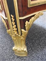 Lot 505 - A French Louis XVI style marble top plum pudding mahogany ebony and ormolu mounted commode