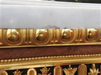 Lot 505 - A French Louis XVI style marble top plum pudding mahogany ebony and ormolu mounted commode