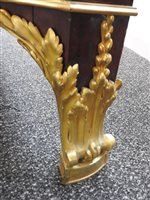 Lot 505 - A French Louis XVI style marble top plum pudding mahogany ebony and ormolu mounted commode