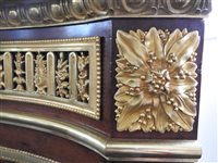 Lot 505 - A French Louis XVI style marble top plum pudding mahogany ebony and ormolu mounted commode