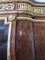 Lot 505 - A French Louis XVI style marble top plum pudding mahogany ebony and ormolu mounted commode