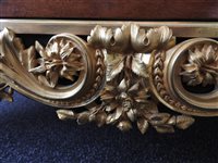 Lot 505 - A French Louis XVI style marble top plum pudding mahogany ebony and ormolu mounted commode