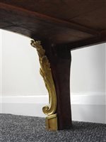 Lot 505 - A French Louis XVI style marble top plum pudding mahogany ebony and ormolu mounted commode