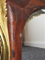 Lot 505 - A French Louis XVI style marble top plum pudding mahogany ebony and ormolu mounted commode