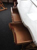 Lot 505 - A French Louis XVI style marble top plum pudding mahogany ebony and ormolu mounted commode