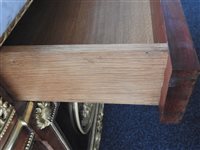 Lot 505 - A French Louis XVI style marble top plum pudding mahogany ebony and ormolu mounted commode