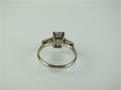Lot 139 - A rectangular cut diamond ring