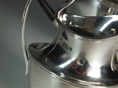 Lot 57 - A three piece silver tea service
