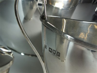 Lot 57 - A three piece silver tea service