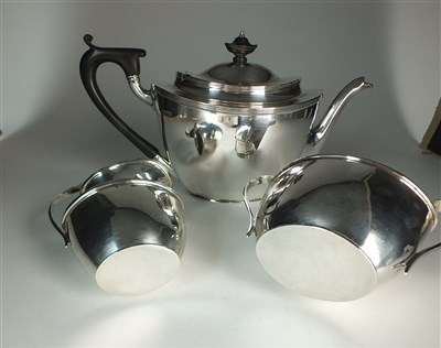 Lot 57 - A three piece silver tea service