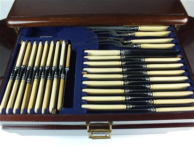 Lot 100 - A canteen of silver plated cutlery