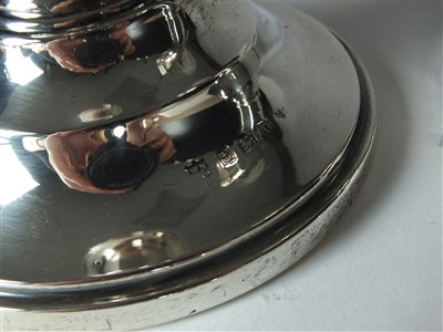 Lot 20 - A pair of silver mounted candlesticks