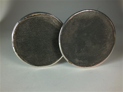 Lot 20 - A pair of silver mounted candlesticks