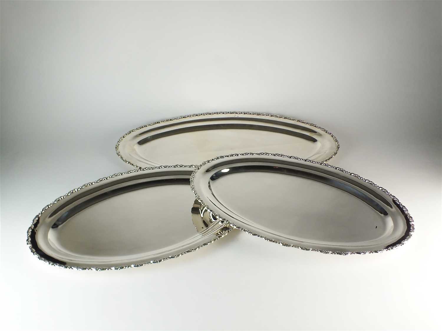 Lot 214 - Three Egyptian silver platters