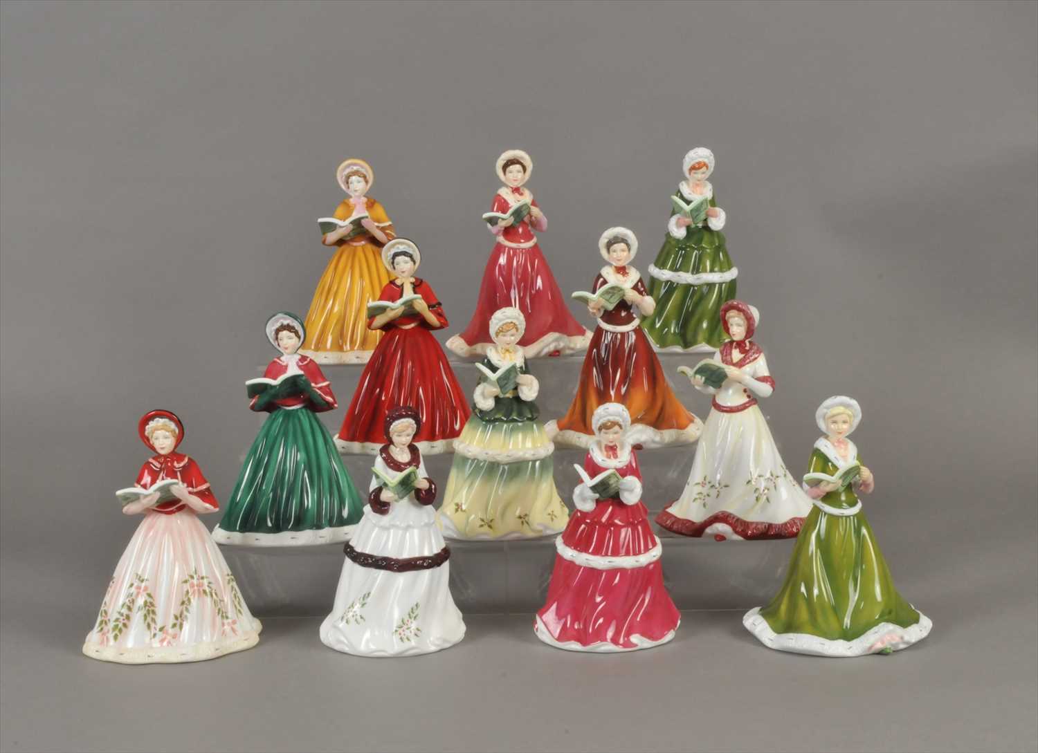 Lot 210 - Set of twelve Royal Doulton 'Twelve Days of Christmas' figures