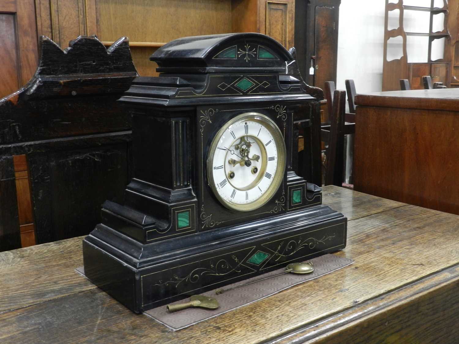 Lot 261 - A French black marble mantel clock, circa 1900,...