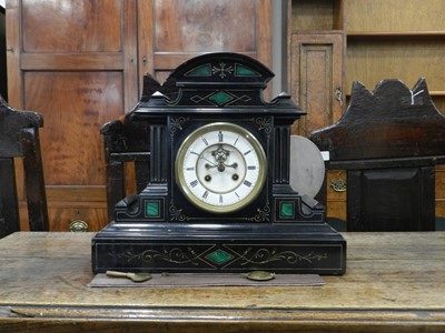 Lot 261 - A French black marble mantel clock, circa 1900,...