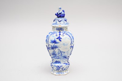 Lot 180 - A Dutch Delft vase and cover