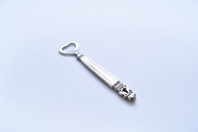 Lot 12 - A Georg Jensen silver handled acorn pattern bottle opener