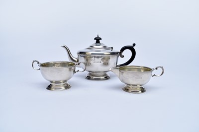 Lot 17 - A three piece silver tea service