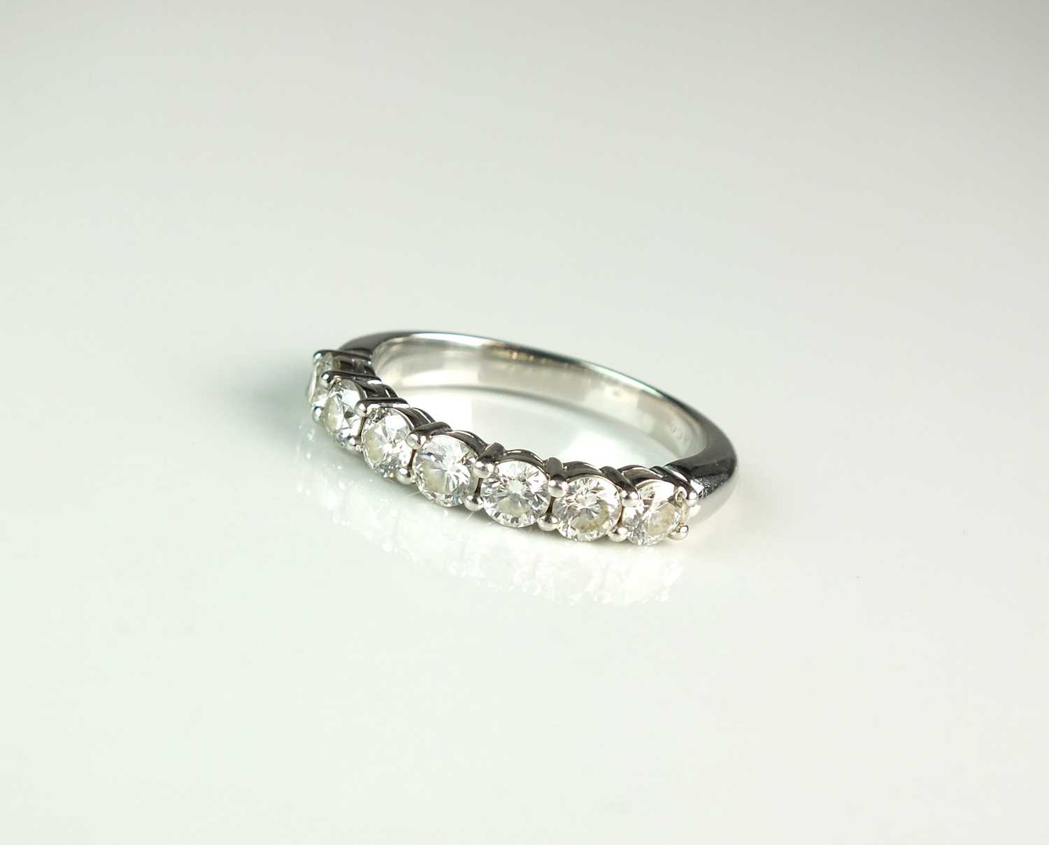 Lot 35 - A Tiffany & Co platinum seven stone diamond ring