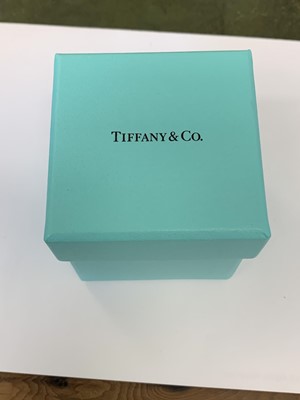Lot 35 - A Tiffany & Co platinum seven stone diamond ring