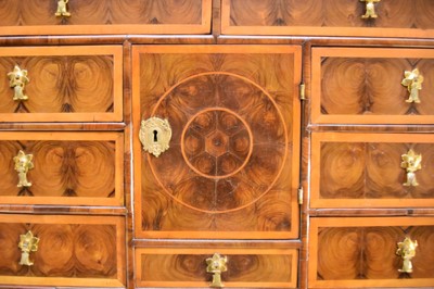 Lot 295 - A William and Mary oyster veneered cabinet on a later stand