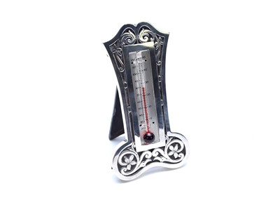Lot 84 - An Edwardian silver mounted thermometer