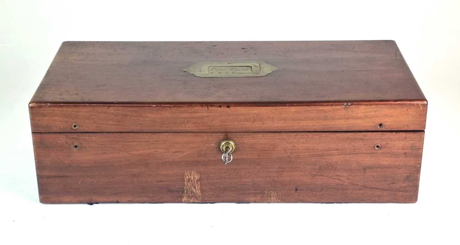 Lot 5 - A mahogany box named to Captain Lyons, H.M.S Madagascar