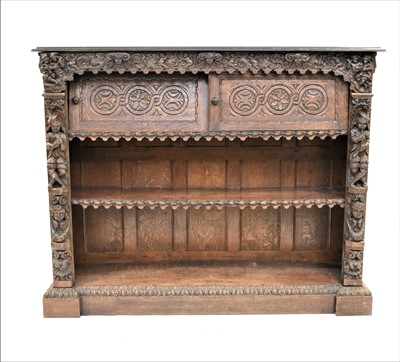 Lot 384 - A late 19th century, Flemish, stained oak, open bookcase