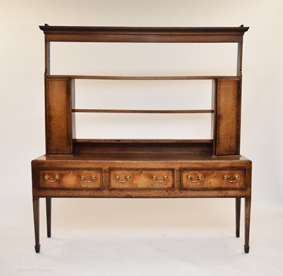 Lot 394 - A late18th century cross-banded oak dresser and rack