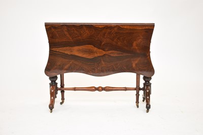 Lot 420 - A mid Victorian rosewood Sutherland table