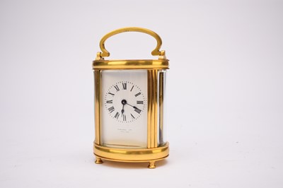 Lot 378 - A French gilt brass carriage timepiece