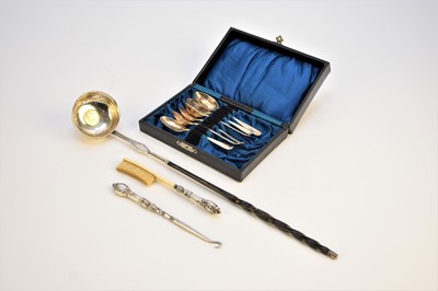 Lot 36 - A set of six silver teaspoons, a toddy ladle, a silver mounted brush and button hook