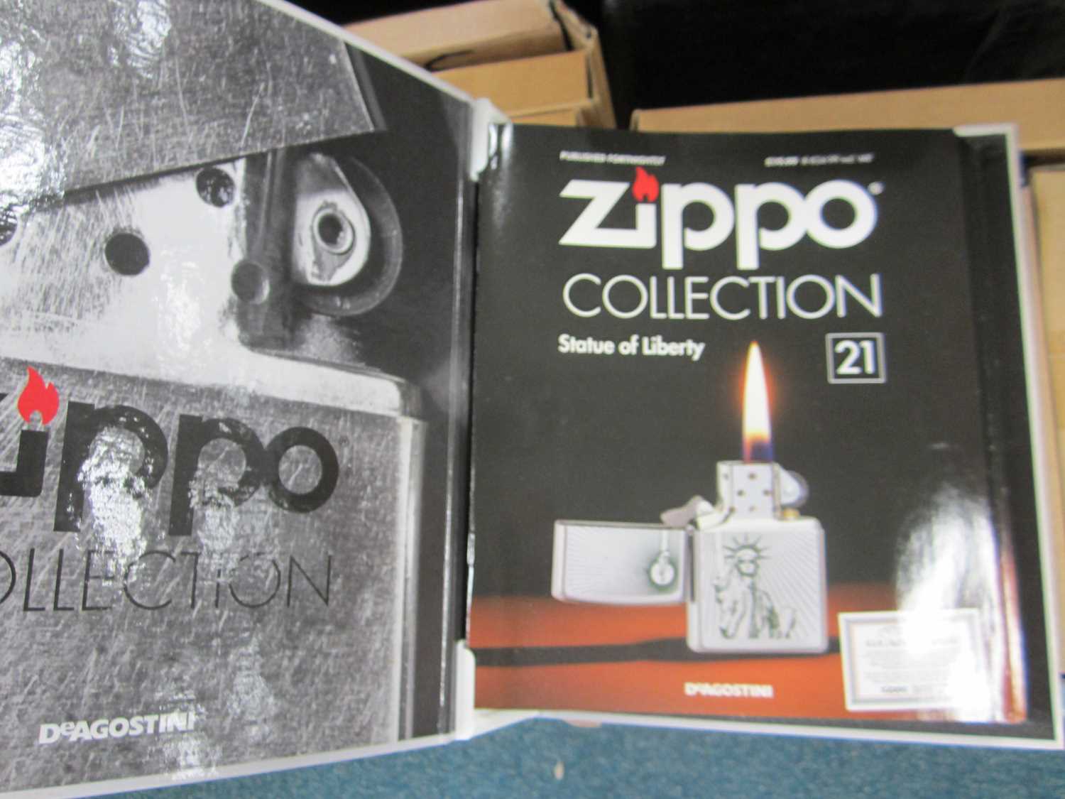 Lot 537 - A collection of 91 DeAgostini Zippo lighters
