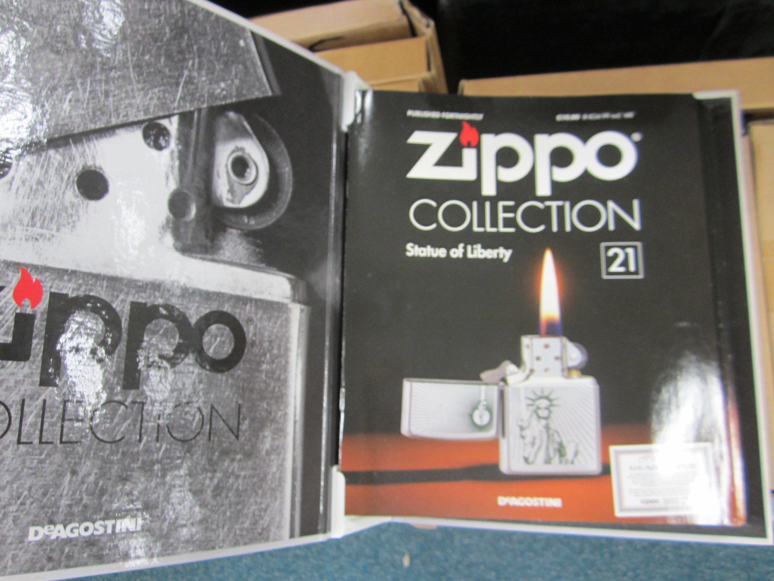 Lot 537 - A collection of 91 DeAgostini Zippo lighters