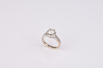 Lot 334 - A brilliant cut diamond halo ring