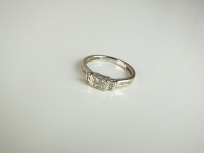 Lot 229 - A Princess cut diamond ring