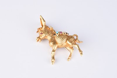 Lot 220 - An 18ct yellow gold gem set novelty donkey brooch