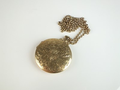 Lot 236 - A 9ct gold circular locket suspended from chain