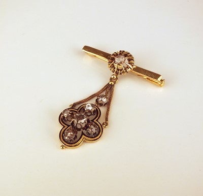 Lot 323 - A rose cut diamond and black enamel brooch