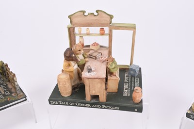 Lot 58 - Beatrix Potter limited edition tableau models and three Royal Doulton Winnie the Pooh characters