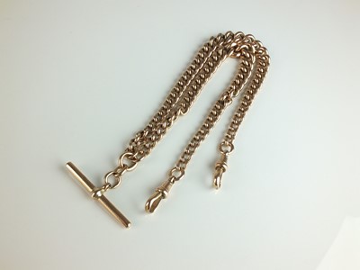 Lot 258 - A 9ct gold graduated curb link Albert chain