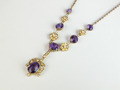 Lot 291 - A late 19th / early 20th century amethyst and seed pearl necklace