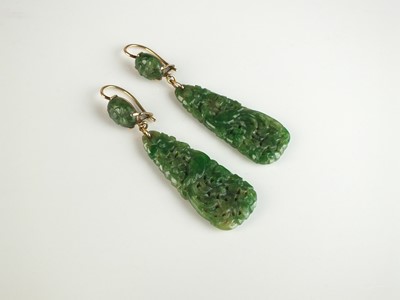 Lot 285 - A pair of Chinese jadeite ear pendants